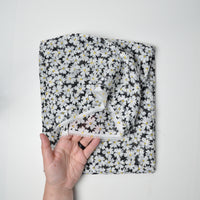 Black + White Daisy Print Sheer Fabric - 60" x 100"