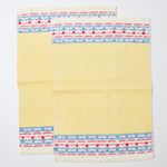 Yellow Napkins with Red, Blue, + White Border - 10" x 14"