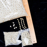 Small Chains of Faux Pearls with Gold Hardware