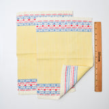 Yellow Napkins with Red, Blue, + White Border - 10" x 14"