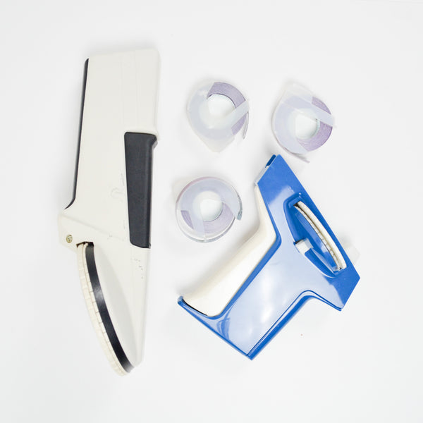 Two Embossing Label Makers with Purple Tape