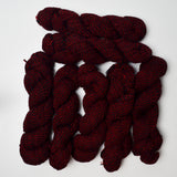 Red + Black Plied Wool Yarn - 7 Skeins